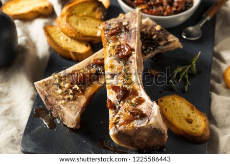Homemade Roasted Beef Bone Marrow with Thyme and Lemon Royalty-Free Stock Photo #1225586443