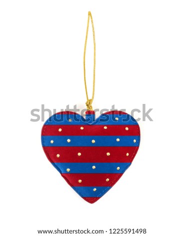 Velvet blue and red heart gift for ornamentation isolated on floral background