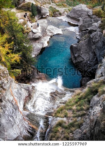 Lillaz Waterfall at the Grand Paradiso National Park, Cogne Village, Aosta Valley Province, Italy, European Alps Royalty-Free Stock Photo #1225597969