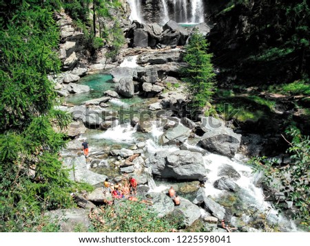 Lillaz Waterfall at the Grand Paradiso National Park, Cogne Village, Aosta Valley Province, Italy, European Alps Royalty-Free Stock Photo #1225598041