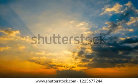 Colorful twilight sky background. abstract sun beam line light shining through the clouds. Sunbeam through the clouds haze on Beautiful sky