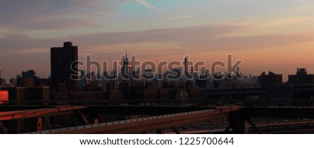 Sunset in the empire street in New York from Brooklyn bridge