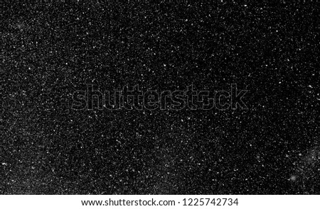 snow, stars, white dots bokeh on black background Royalty-Free Stock Photo #1225742734