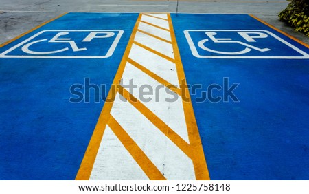Disabled parking sign on background, Symbol wheelchair reminder
