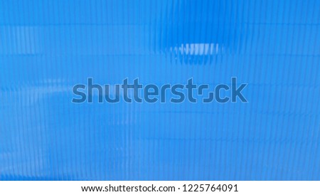 Light blue background.