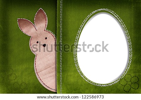 Easter bunny on textile background with space for your text