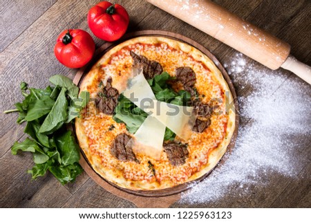 italian pizza vegetarian and with meat