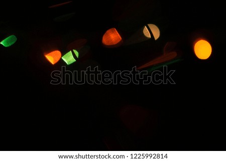 abstract lens flare background with blurred lights, optical effect of bokeh