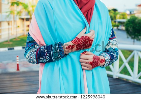 Brides with henna on hands