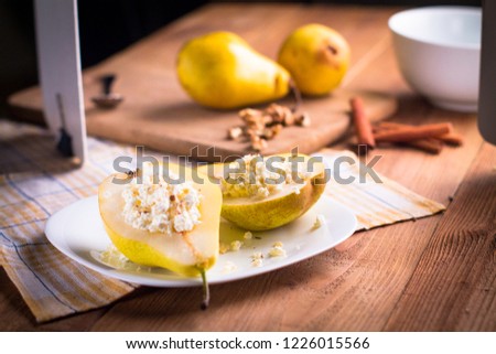 Backstage with a shot of pears with cottage cheese, nuts and cinnamon. Preparing the frame for shooting. Creating a photo
