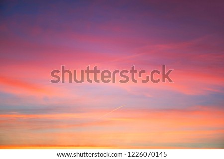 
Sky in the pink and blue colors. effect of light pastel colored of sunset clouds 