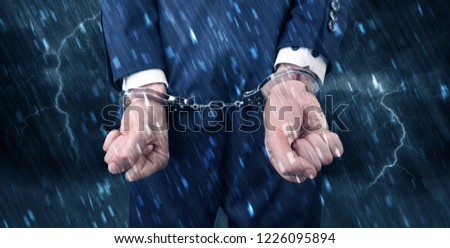 Stormy bad day concept with close handcuffed elegant man