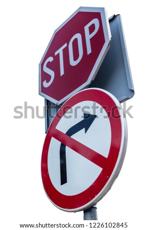 a stop road sign over a roadsign that forbid to turn right