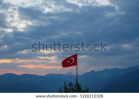 Turkish flag hangs on the mountain