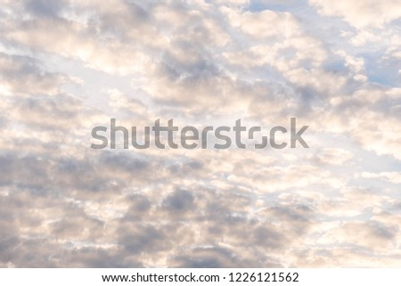 Beautiful cloudy sky in sunset with God light message. Space for text.