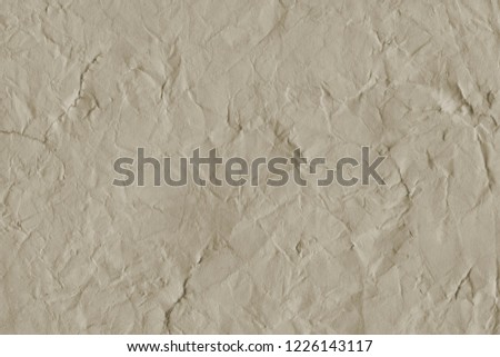 Old grunge paper texture. Vintage background for design and scrapbooking. Old, compressed and crumpled effect.
