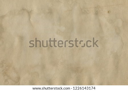 Old grunge paper texture. Vintage background for design and scrapbooking. Old, compressed and crumpled effect.