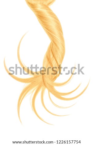 Curl of natural blond hair on white background