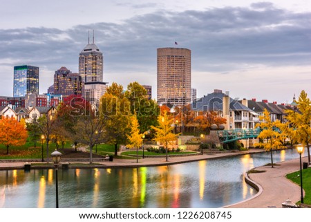 Indianapolis, Indiana, USA downtown cityscape on the White River at dusk.