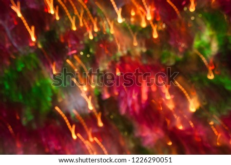 Background. Christmas bokeh. Pattern with traditional colours. Red, green, yellow texture