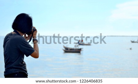 Tourists taking pictures view
