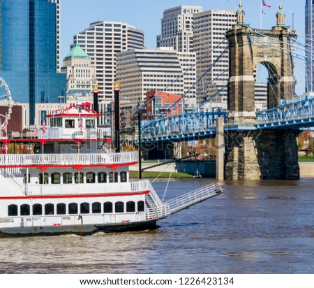 Cincinnati Ohio river front boat bridge and cityscape in looking from Covington Kentucky urban exploration photography