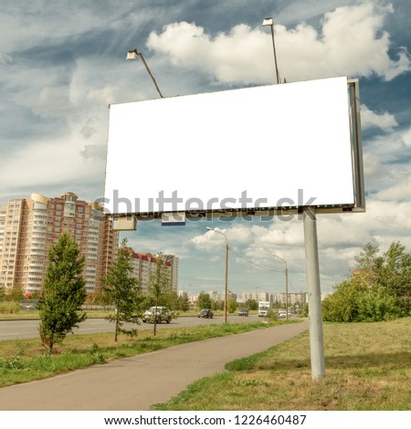Billboard mockup in city background. suny summer weather , cloudy sky