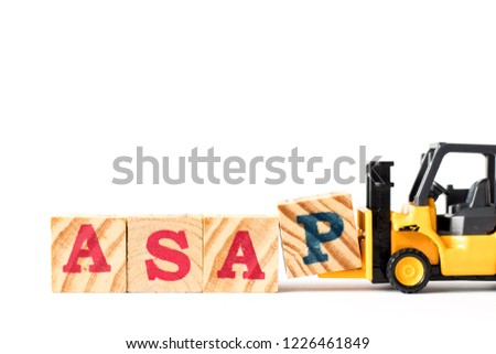 Toy forklift hold letter block p to complete word ASAP (abbreviation of as soon as possible) on white background