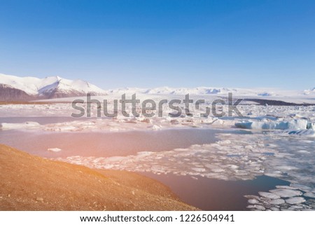 Iceland Jakulsalon water lake with clear blue sky background, natural landscape