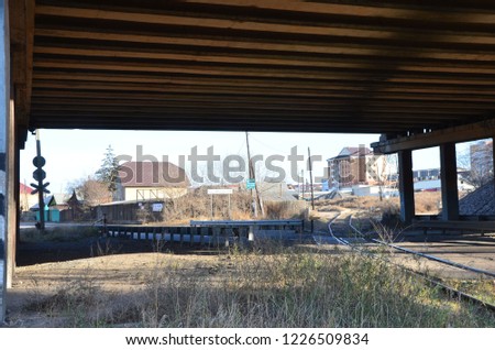 This picture shows a bridge bottom with railway