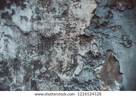Old gray wall with chipped paint. the picture was made in Tbilisi, Georgia. 