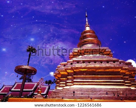 Phra Thad Jomtong pagoda in Wat Phra Thad Jomtong temple Chiangmai Thailand. This photo is retouched to a galaxy photo.