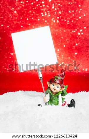 Green forest fairy holding an empty shiny banner on red background
