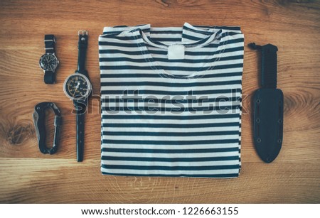 Sailor shirt and diver accessories. Retro diver equipment, depth meter, diver’s watch and knife