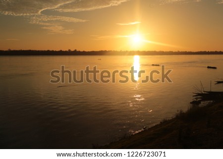 Sunrise at Mekong River, Thailand, Morning sun over the Mekong River between Thailand and Laos.