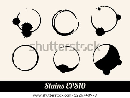 Set of 6 round black grunge circle ring stains, wine or coffee, isolated on white background. Monochrome vector illustration EPS10