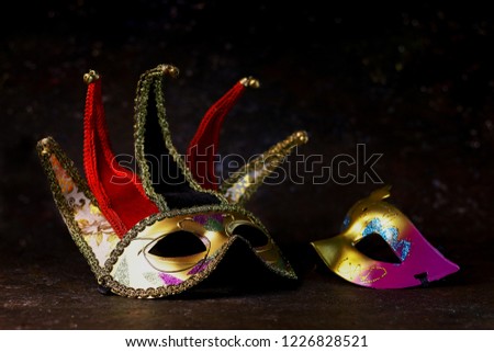 Carnival venetian masks on dark background. Carnival masks side view.
