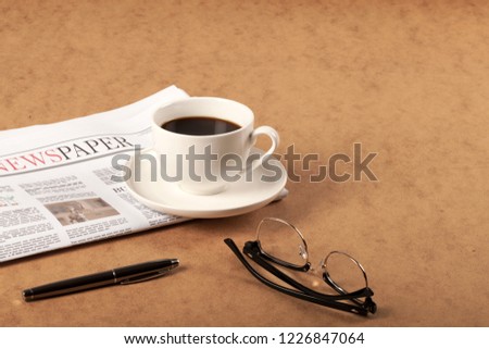 newspaper over office desk