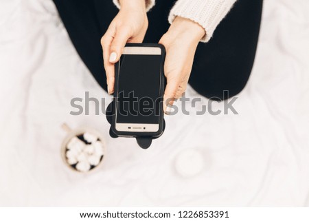 Women with phone.Minimal photo,white background.Top view.Mock up.