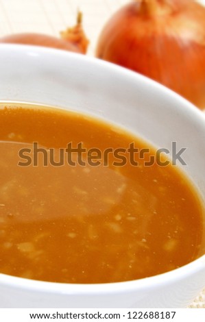 closeup of a bowl with onion soup
