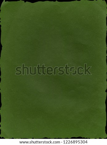 Green grunge paper texture. Vintage background for design and scrapbooking. Old, compressed and crumpled effect.