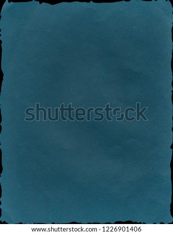 Blue grunge paper texture. Vintage background for design and scrapbooking. Old, compressed and crumpled effect.