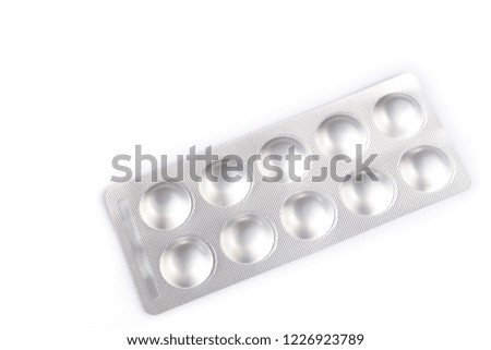 pack of silver tablets close up, first aid kit for medical care