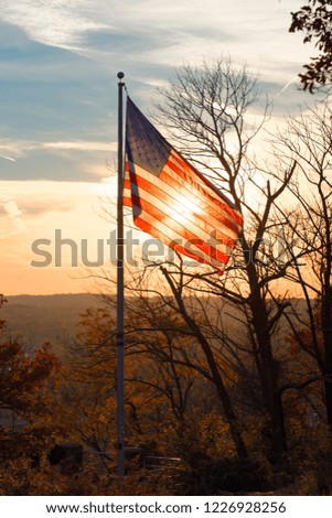 American flag on sunset background 