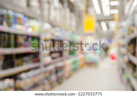 Abstract blur and bokeh beautiful shopping mall and department store interior for background. Supermarket.