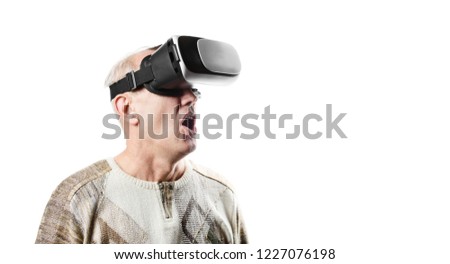 adult man in virtual reality mask is isolated on white background. vr 360 vision goggles enjoying video game isolated on clear background in innovation and gaming technology concept.