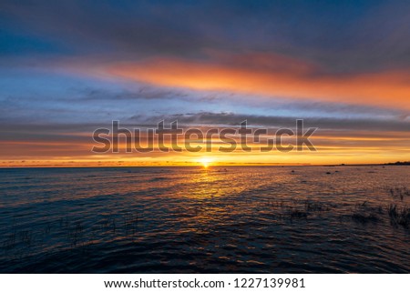 Colourful Sunrise at the rocky Baltic Sea during autumn.