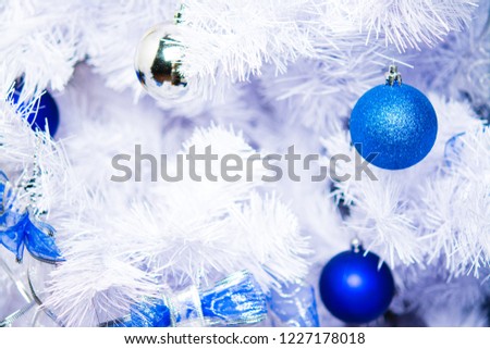 New Year or Christmas decorations on an abstract background, bokeh effect. Can be used as wallpaper or greeting card. Selective focus, copy space.