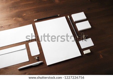 Blank stationery set on wooden table background. ID template. Mockup for branding identity for designers.