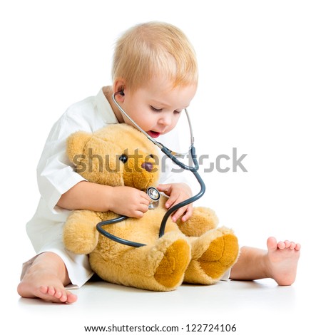 kid playing a doctor isolated on white Royalty-Free Stock Photo #122724106